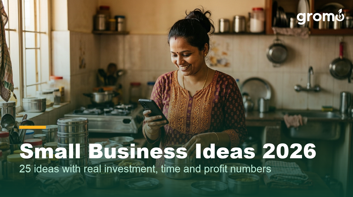 Indian woman running her small tiffin business from home while checking orders on her phone