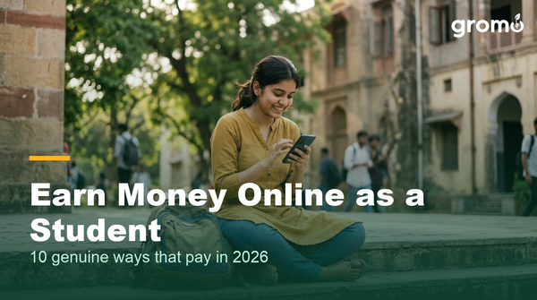 Indian college student earning money online using a mobile phone on campus