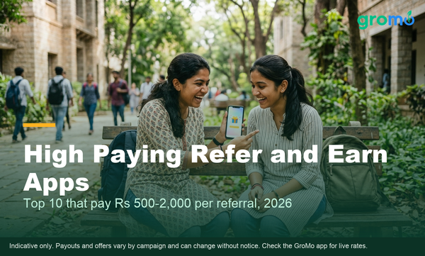 Indian friends celebrating a high paying refer and earn reward on a smartphone