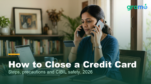 Indian woman closing her credit card by calling the bank with the application email ready