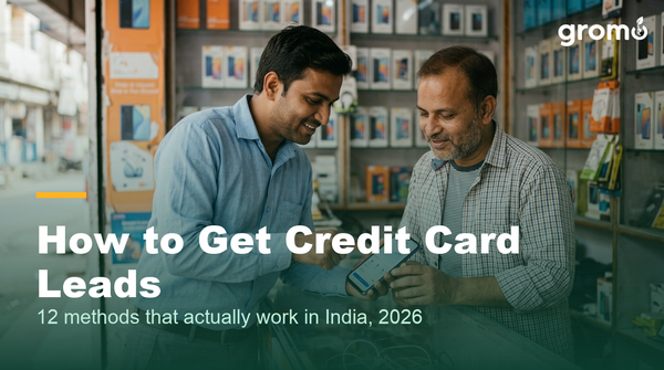 Credit card agent generating leads through a shopkeeper tie-up in an Indian market
