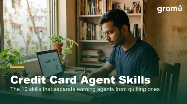 Young Indian credit card agent studying product details and building his selling skills