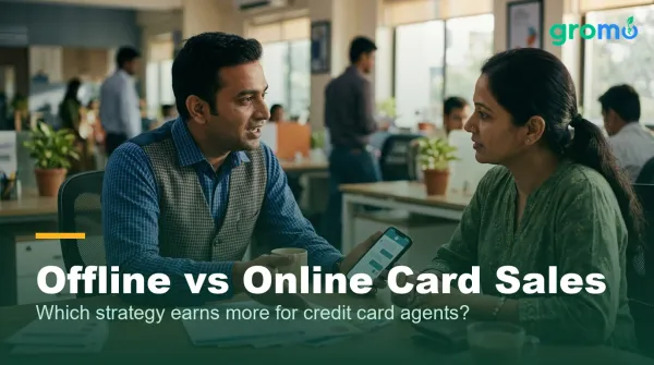 Indian credit card agent balancing offline customer meetings and online selling on his phone
